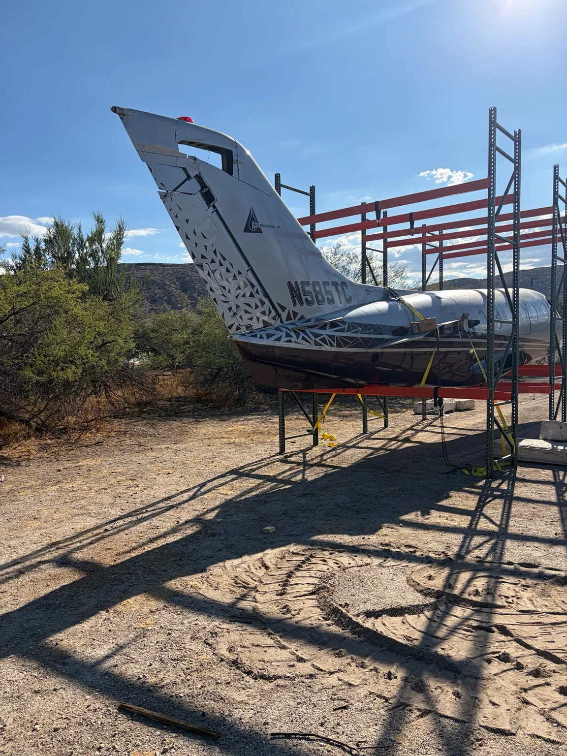 The aircraft fuselage resting on supports at the build location.